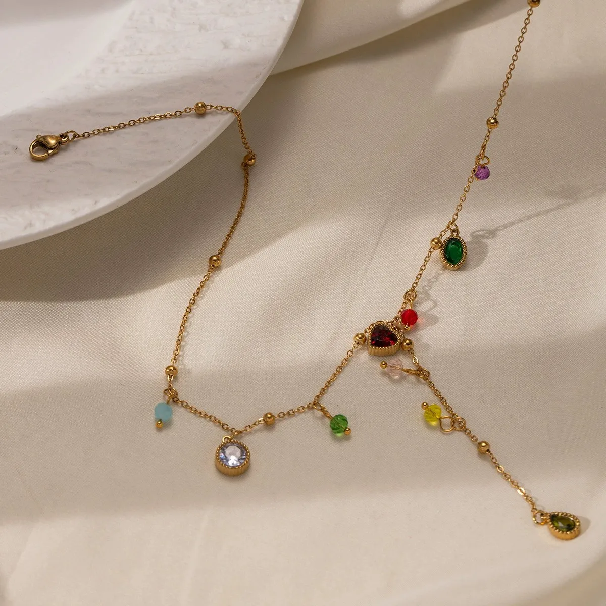 Edelstahl-Halskette mit farbigem Zirkon und Quaste, luxuriöse lange Halskette mit herzförmigem Perlenanhänger, Zirkon-Quaste, nicht verblassender Schmuck – Detail 1