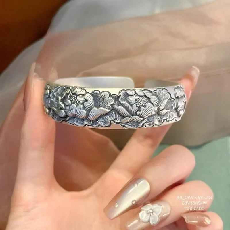 

Hot selling Handmade relief peony flower with ethnic style and exquisite bracelet in Tibetan silver
