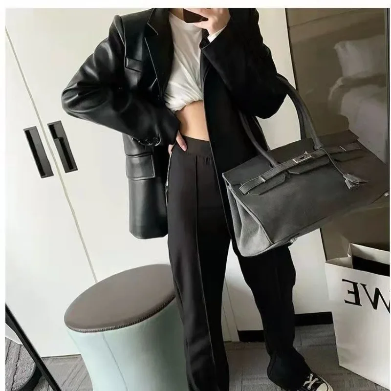 春と秋の新作韓国風ルーズレトロブラウンレザースーツルーズカジュアルスーツジャケット女性用ファッショナブルハイエンドコート