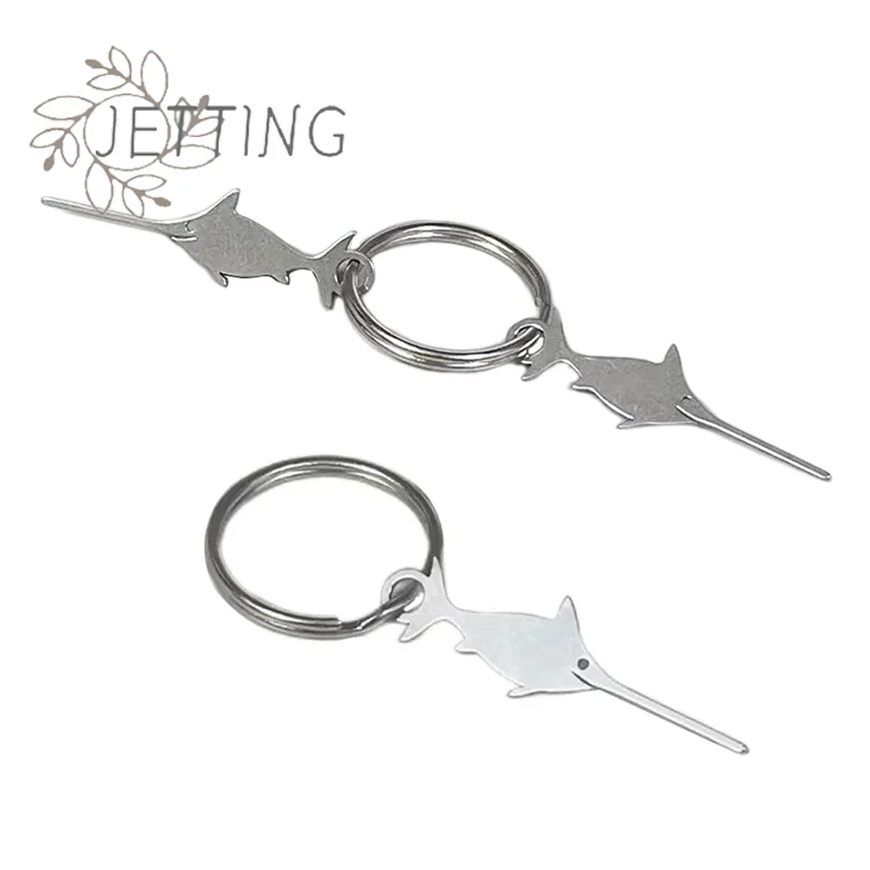 إبرة من الفولاذ المقاوم للصدأ على شكل سمكة أبو سيف ساخنة للهواتف الذكية، أداة إزالة علبة بطاقة Sim، أداة مفتاح إخراج كشتبان عالمي