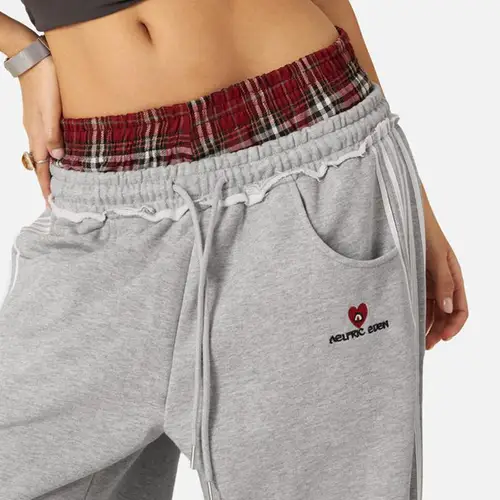 Imagen 2 del producto Conjunto de dos piezas holgado estilo universitario Retro americano con pantalones de baño falsos con cabeza de doble cintura para deportes de ocio moda 2025