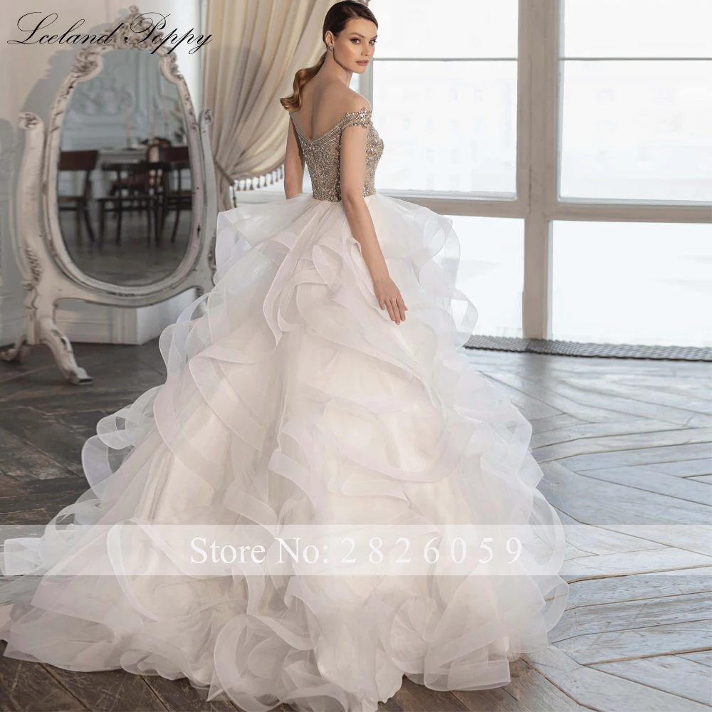 Lceland Poppy A Line V Neck Tiered Tulle Wedding Dresses Luxury Crystal Beaded Floor Length Bridal Gowns with Ruffles