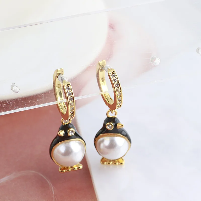 

Cartoon penguin set with pearl earrings