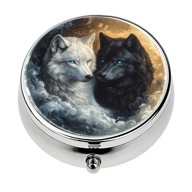 A small pill box with a yin-yang wolf pattern, featuring a three-compartment design. This metal storage box is perfect for travel or office use and makes an excellent gift for Halloween or Christmas.