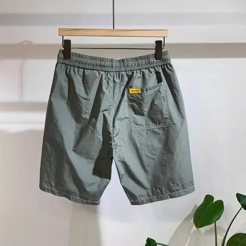 2024 Men\'s Sports Shorts Summer Graphic Sweatpants High Street Fashion Green Shorts High Quality Beach Quick Drying Shorts New