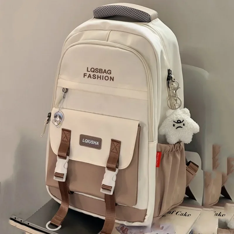 

The new college style soft girl color schoolbag Korean version simple letter backpack for primary and secondary school students