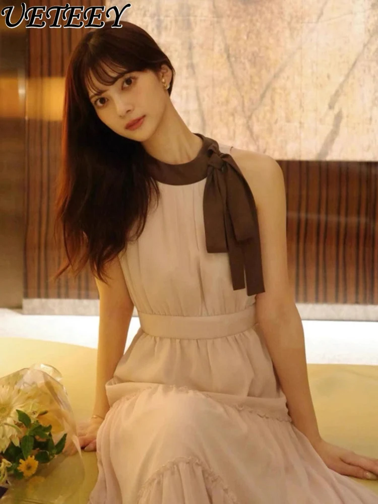 Lente en zomer nieuwe zoete stijl halter hals ronde hals hoge taille afslankjurk mode stip vlinderdas lange jurken