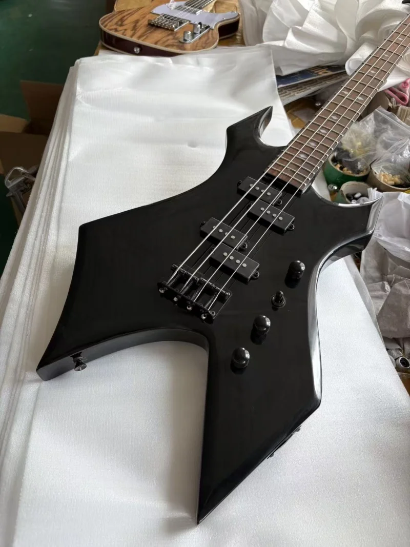 Black 4-string special-shaped bass, rosewood fingerboard with diamond inlays, black hardware, high-gloss finish, free delivery