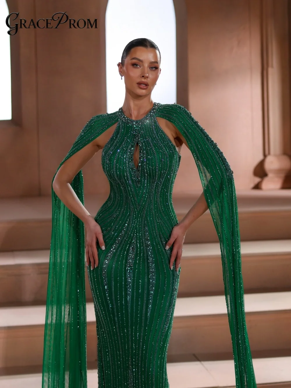 Elegant Beaded Cape Sleeve Evening Gown 2026 Emerald Green High Neck Keyhole Mermaid Party Dress For Wedding Guests فساتين سهرة