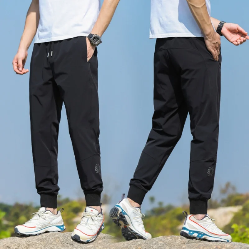 Pantaloni estivi sottili ad asciugatura rapida da uomo 2024 nuovi vestiti da uomo all'aperto Stretch pantaloni da arrampicata sportivi ricamati alla moda traspiranti