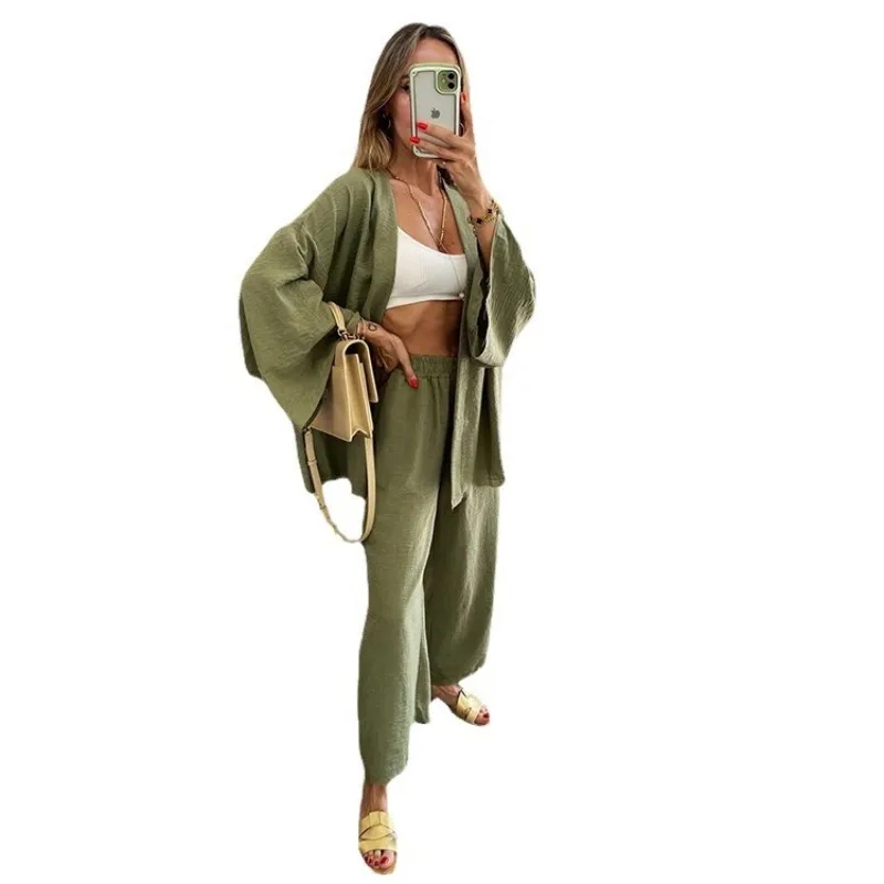2025 Primavera/Novedad de verano, conjunto informal de algodón y cáñamo, cárdigan, manga larga, bolsillo superior, conjunto de dos piezas, pantalones de nueve centavos arrugados de seda helada