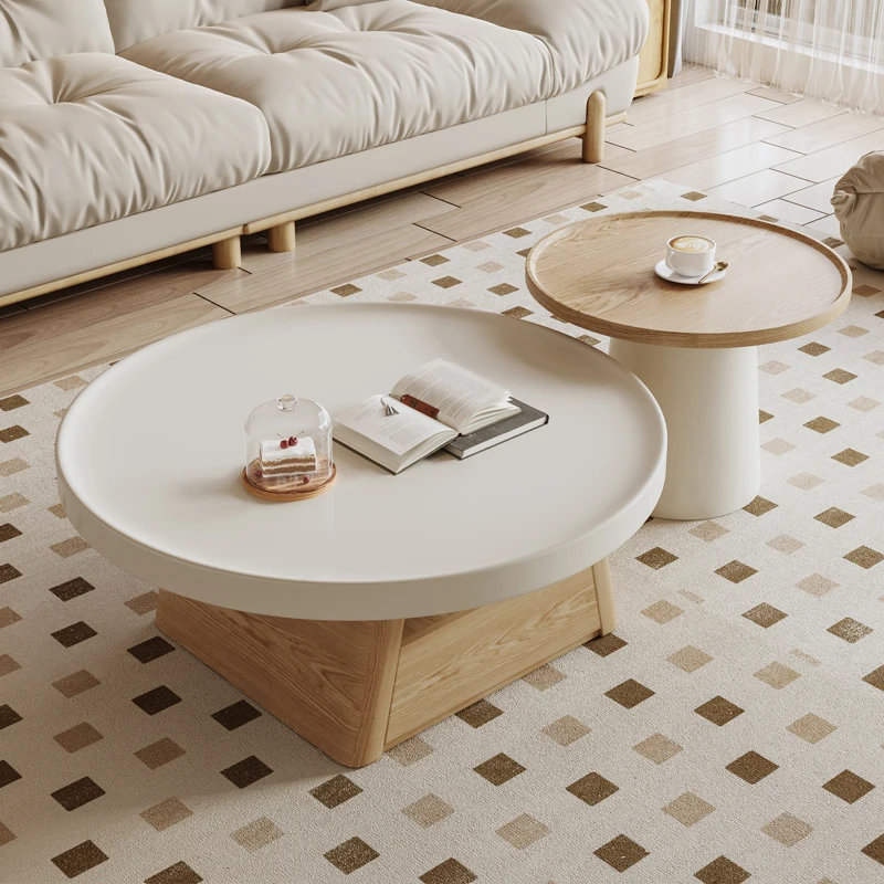 A combination of small units in the living room, family, cream style circular coffee table, antique style table, large and small