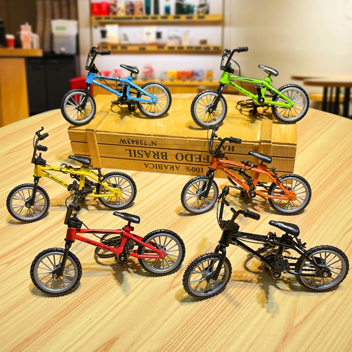 Mini modelo de bicicleta de aleación con estante de estacionamiento, decoración fundida, dedo de montaña de Metal, bicicleta azul, simulación, regalo para niños, juguetes para niños