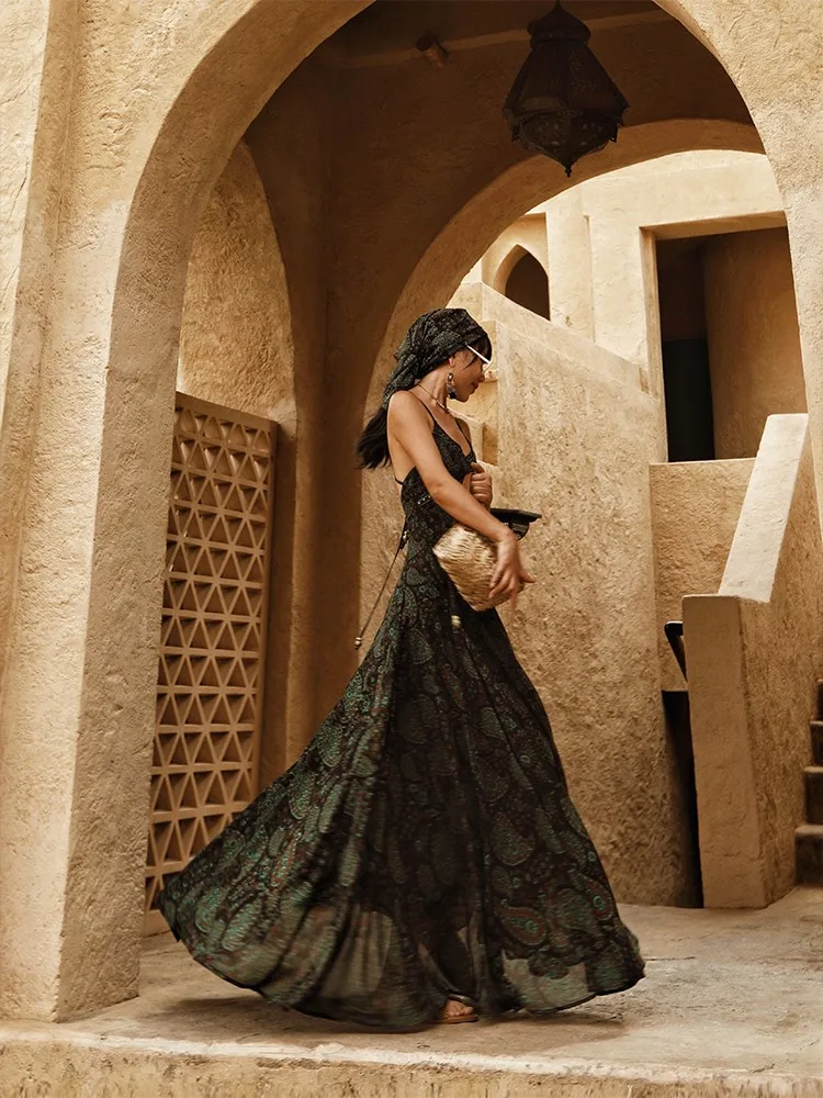 

Vacation-style exotic printed long and short halter dress