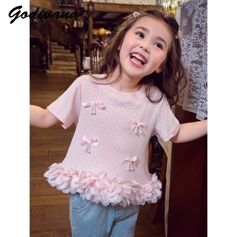 

Sweet Baby Girls Summer 2026 New Korean Tops Childrens Cute 3d Petal Hem Short Sleeve O-neck Pearl Bow Soft Breathable T-shirt