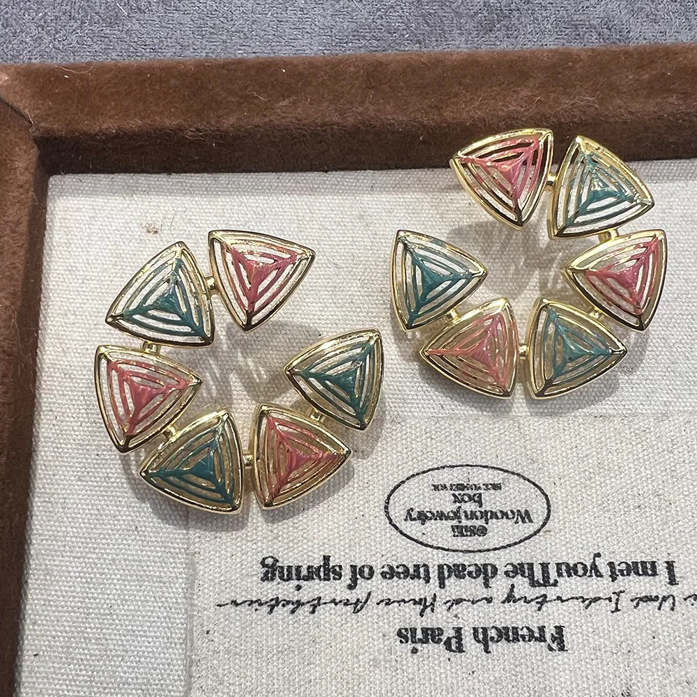 Hollow geometry low temperature enamel color vintage retro court style niche design sense versatile is S925 earrings
