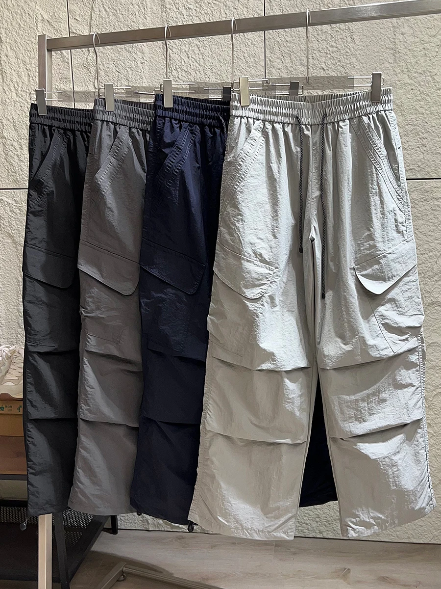 Outdoor Men's Casual Pants Multi-Pocket Work Trousers Loose Fit Elastic Waist Spring Season Windproof Waterproof Durable