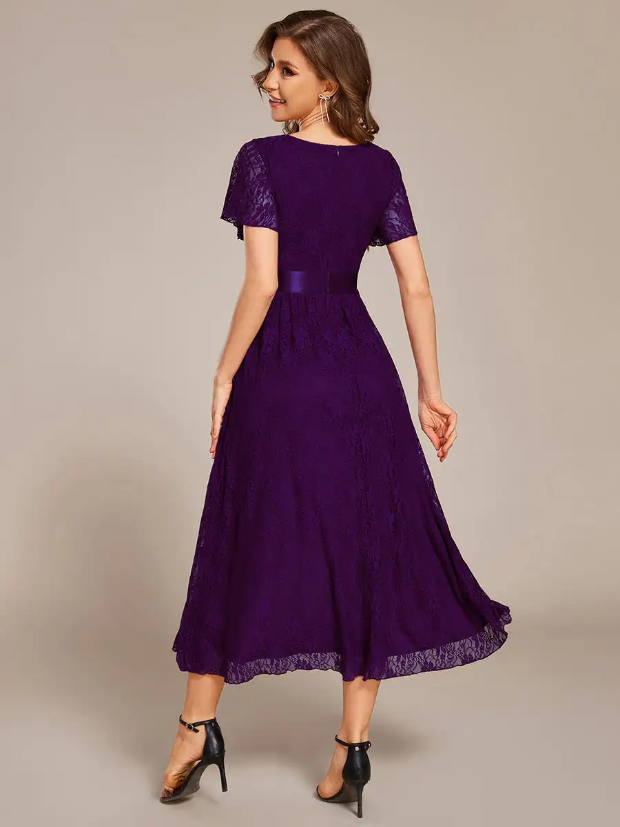 Robes de soirée à ourlet asymétrique avec décoration brodée