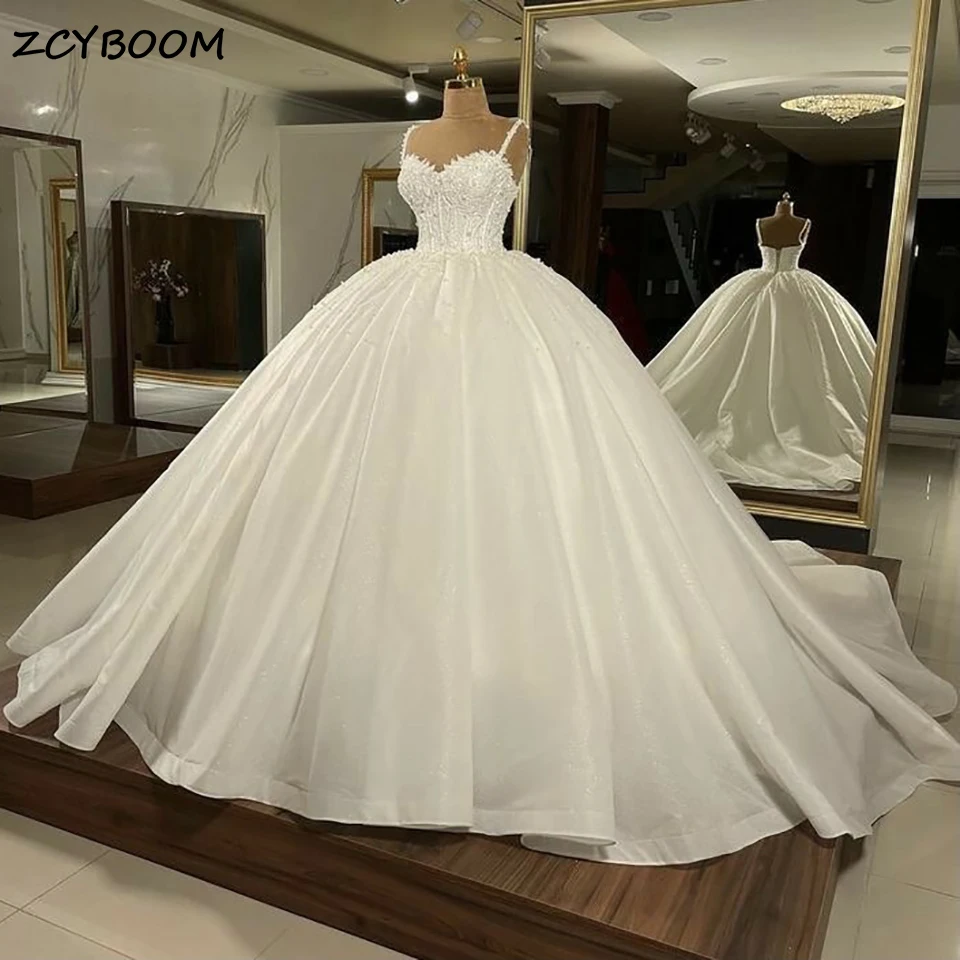 

Luxury Ball Gown Sparkling Pearls Beading Wedding Dresses 2023 Princess Sweetheart Spaghetti Straps Bride Gown Vestidos De Novia