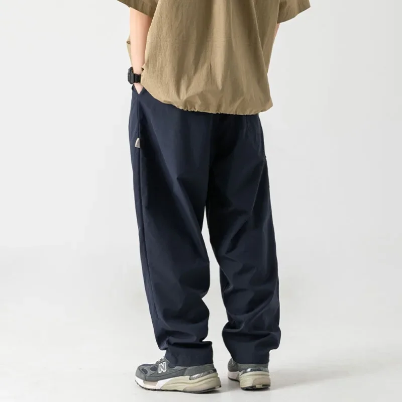 Pantalones Cargo con bolsillos con cremallera lateral para hombre, modelos de primavera y otoño, pantalones de Joggers de estilo japonés, ropa de calle informal para exteriores, pantalones sueltos