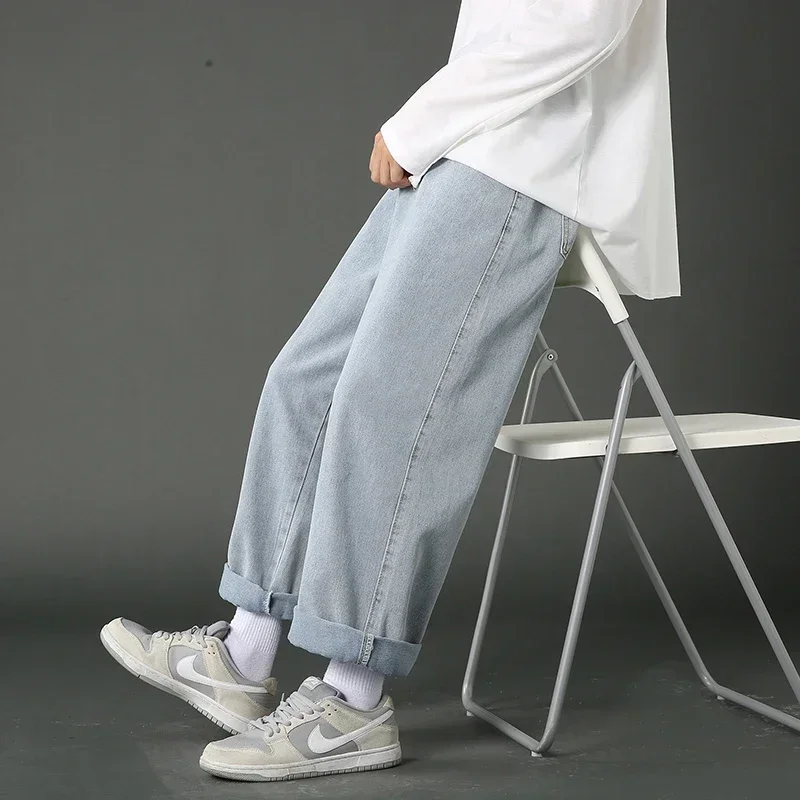 Celana Denim pasangan pria, Jeans longgar kasual Mode Korea Hip Hop kaki lebar lurus hitam biru muda 2023