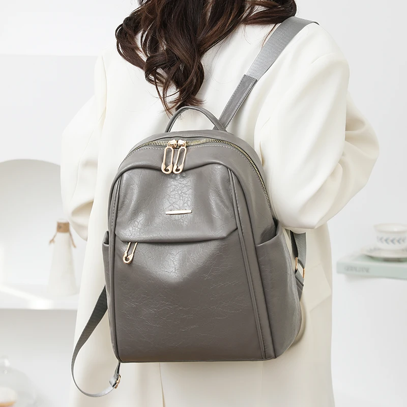 スタイリッシュな Pu レザー女性のバックパック大容量盗難防止ラップトップバッグ大学スクールバッグ旅行リュックサック女性のバックパック