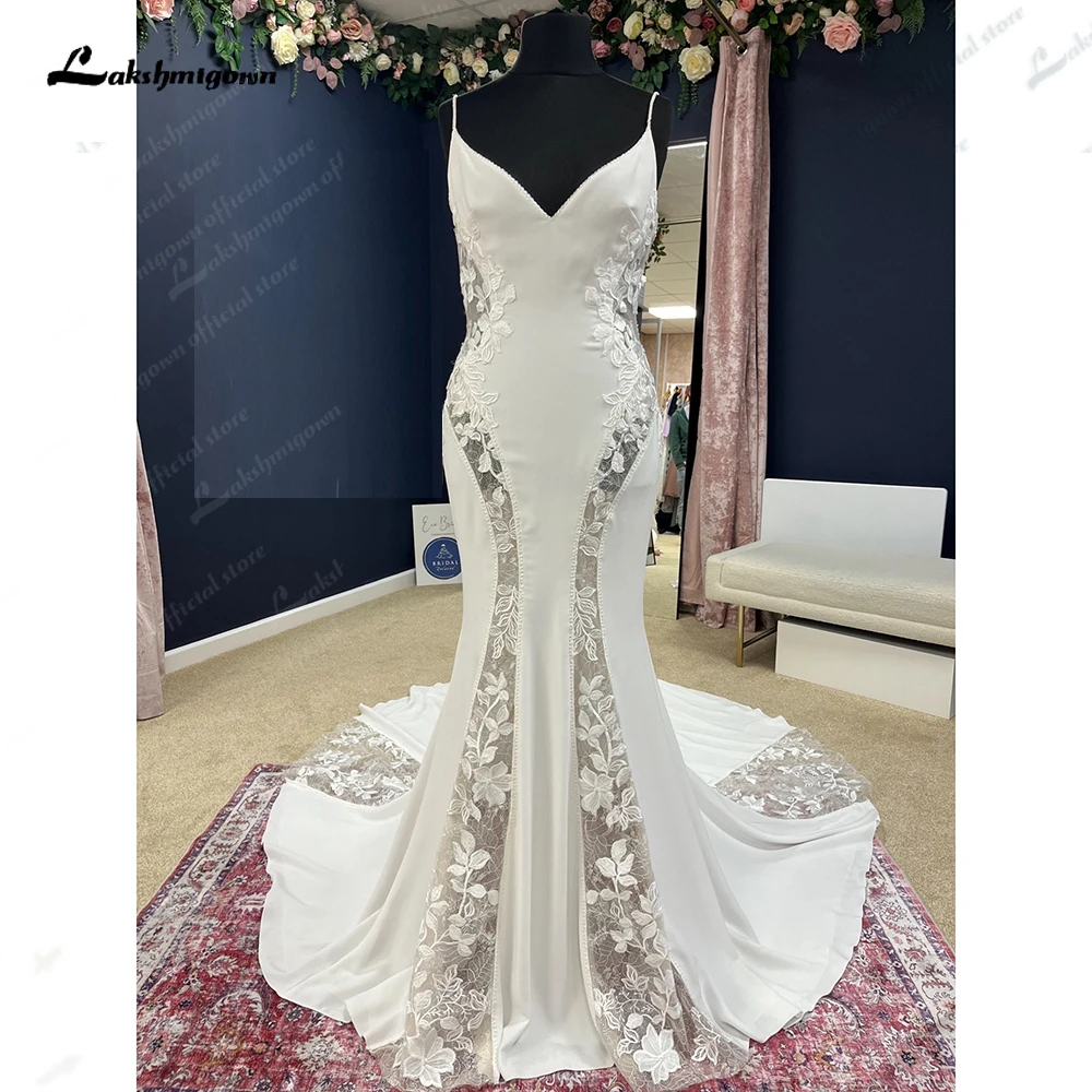 Lakshmigown Lace Applique Wedding Dress with V-neck Cutout Detail Fish Tail Hemline Spaghetti Straps Mermaid Bridal Dress