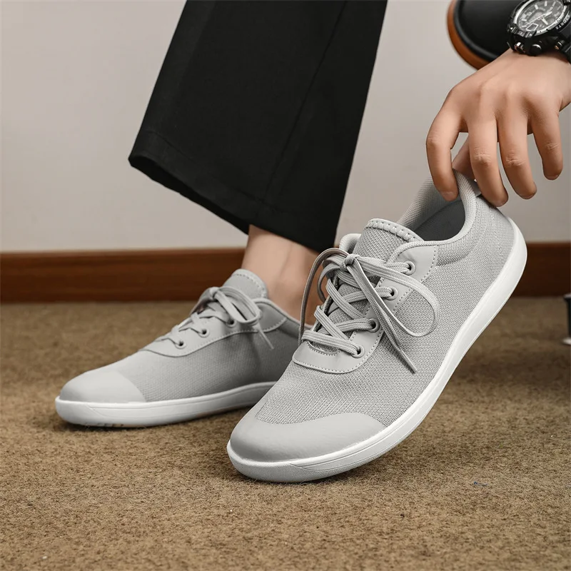 

Men's Wide Toe Barefoot Shoes Lace Up Men Sneakers Breathable Mesh Unisex Casual Shoes Sports Training Shoes Plus Size 48