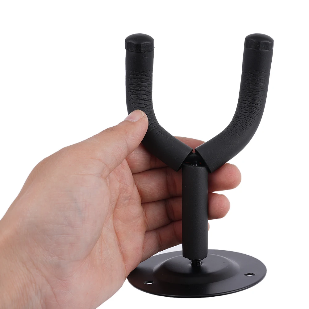 

Convenient Wall Mount Guitar Stand Bracket with Foam Padding Perfect for Displaying and Safely Storing Your Instruments