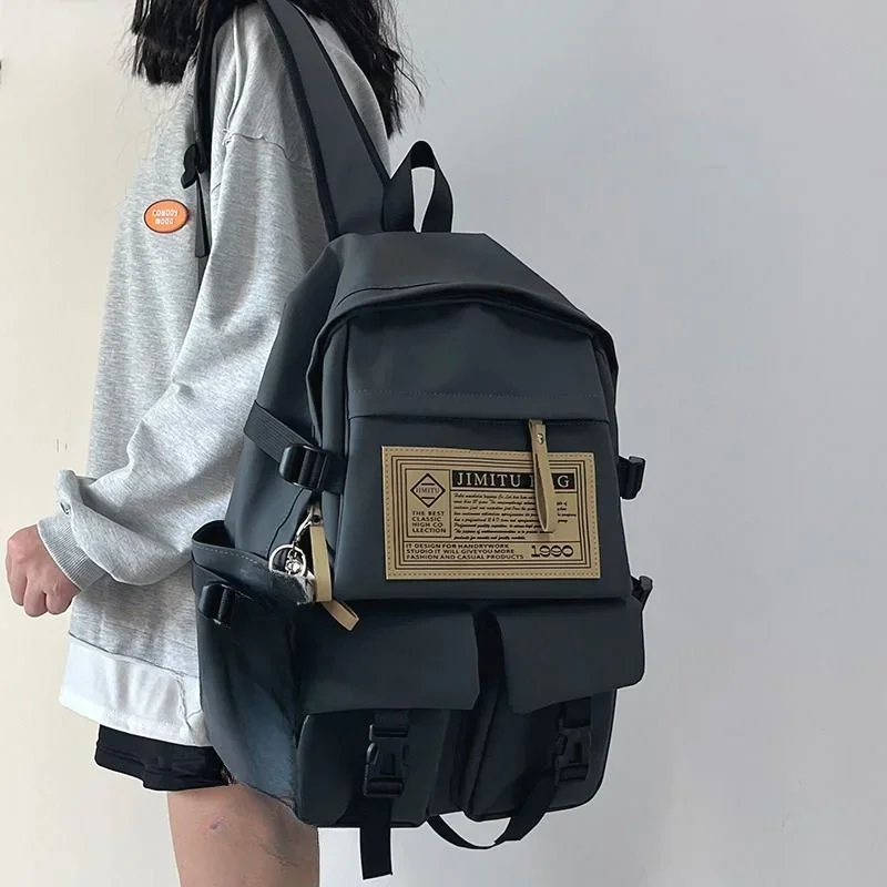 Nueva mochila escolar para estudiantes universitarios, mochila impermeable de viaje para estudiantes de secundaria, bolso de moda para hombre de gran capacidad para niño