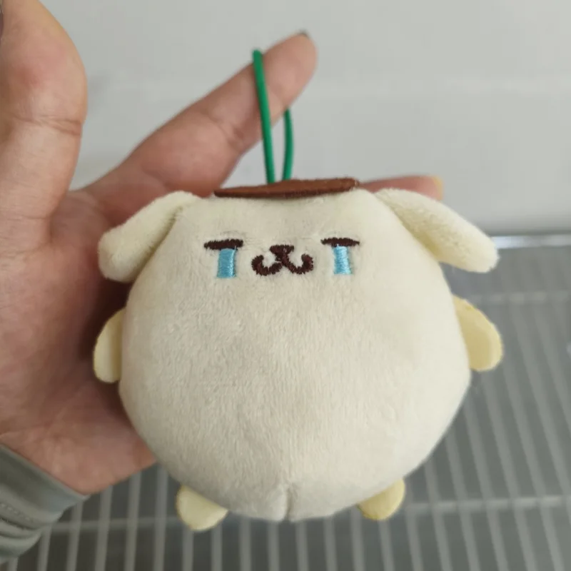 Kawaii Sanrio Pom Pom Purin Plush จี้อะนิเมะการ์ตูนร้องไห้ Expression ตุ๊กตาพวงกุญแจตุ๊กตาของเล่นกระเป๋าเป้สะพายหลังตกแต่งของขวัญ