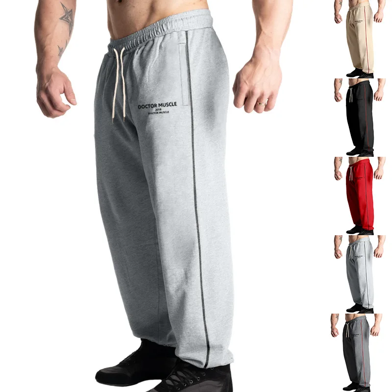 

comfortable, versatile and sporty. These are straight-leg printed drawstring men's casual pants with color-blocked stripes.