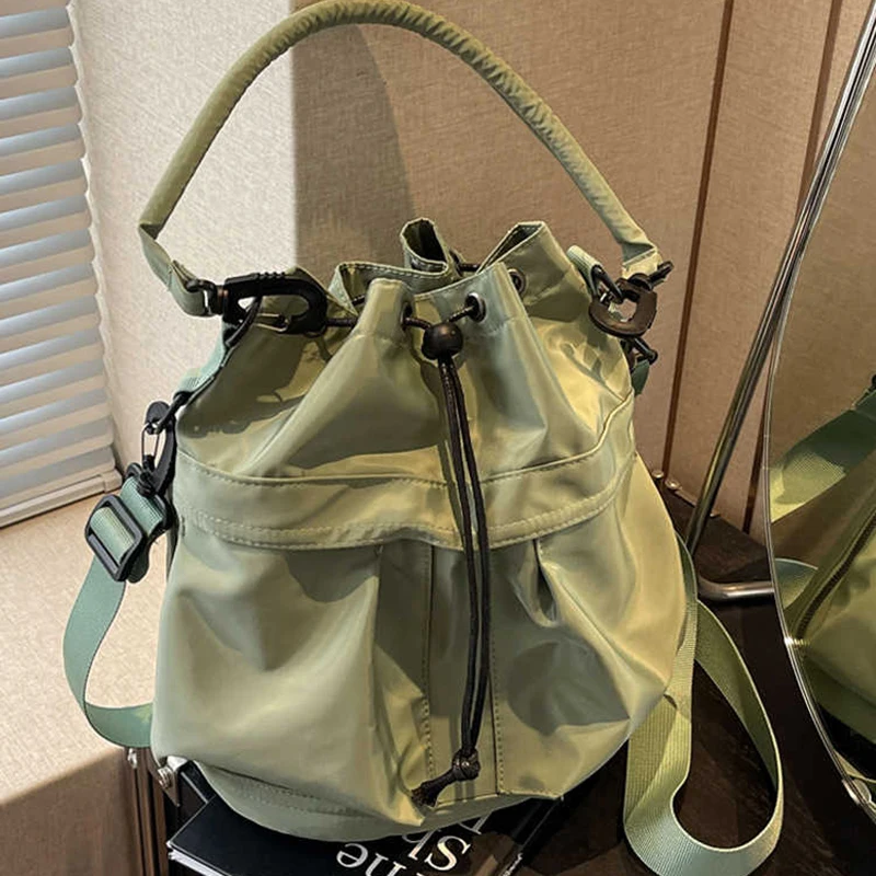 

Women's Large Capacity Drawstring Bucket Bag Leisure Lightweight Multi-pocket Canvas Crossbody Bags Solid Color Travel Handbags