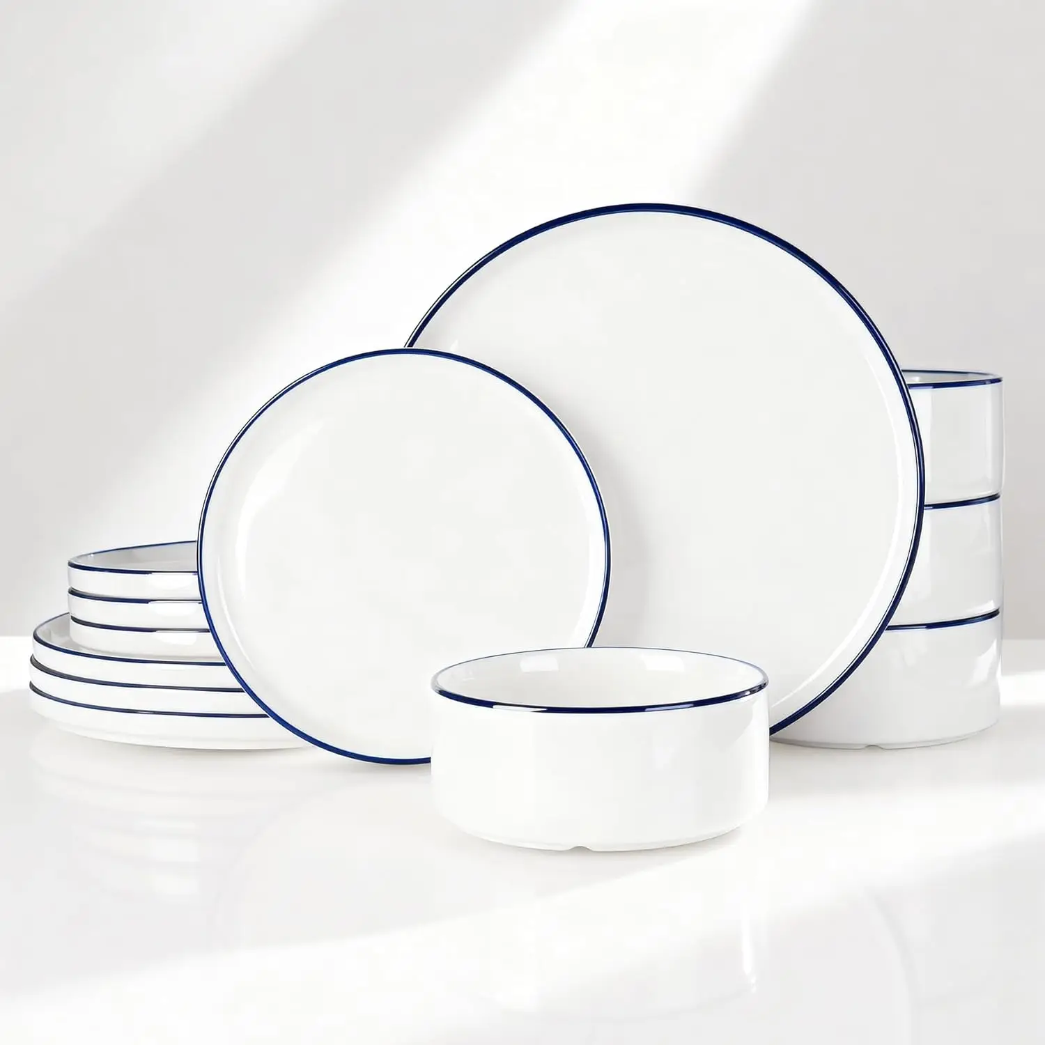 

12-Piece Porcelain Dinnerware Set, Modern Plate and Bowl Set for 4, Microwave and Dishwasher Safe, White with Blue Trim