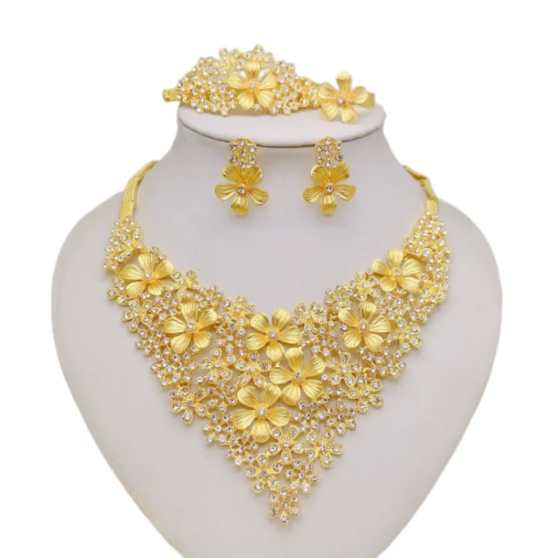 Elevate your elegance with our Golden Floral Jewelry Set adorned with sparkling zircons perfect for any occasion Captivate shine