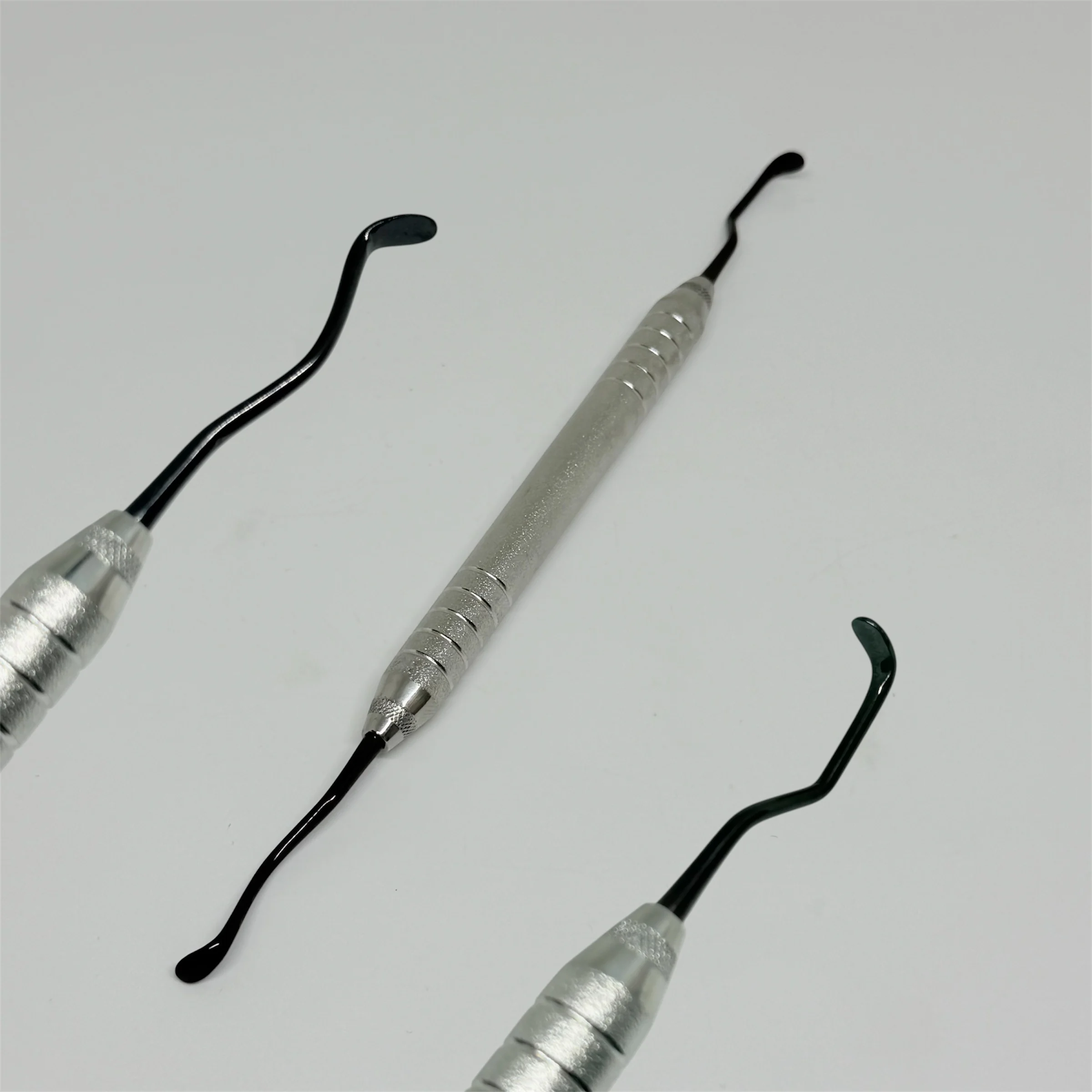 DENILK 1pc Dental Periosteal Elevator Separator Tool - Stainless Steel Black Coated Periosteum Dissector - Optimal Edge Retentio