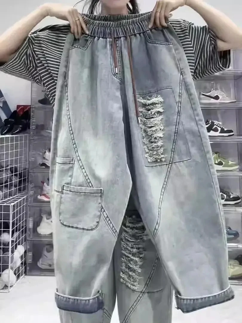2026 Spring Autumn New Korean Fashion Women Elastic Waist Cotton Denim Harem Pants Hole Design Vintage Blue Loose Jeans