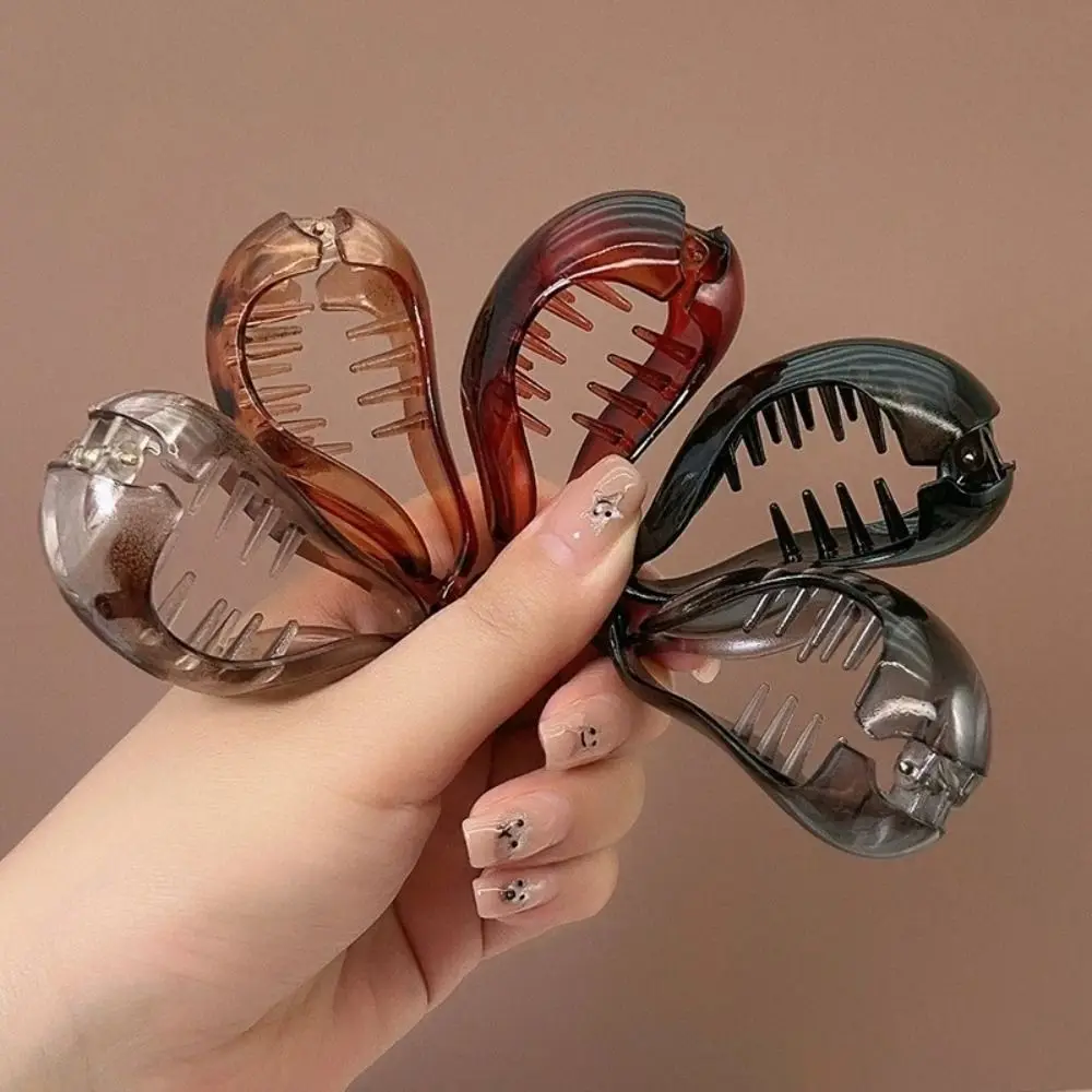 

4pcs Retro Style Non-Slip Banana Hair Clip Leopard Print Oval Shape Vertical Clip Stylish Hair Claw Girl