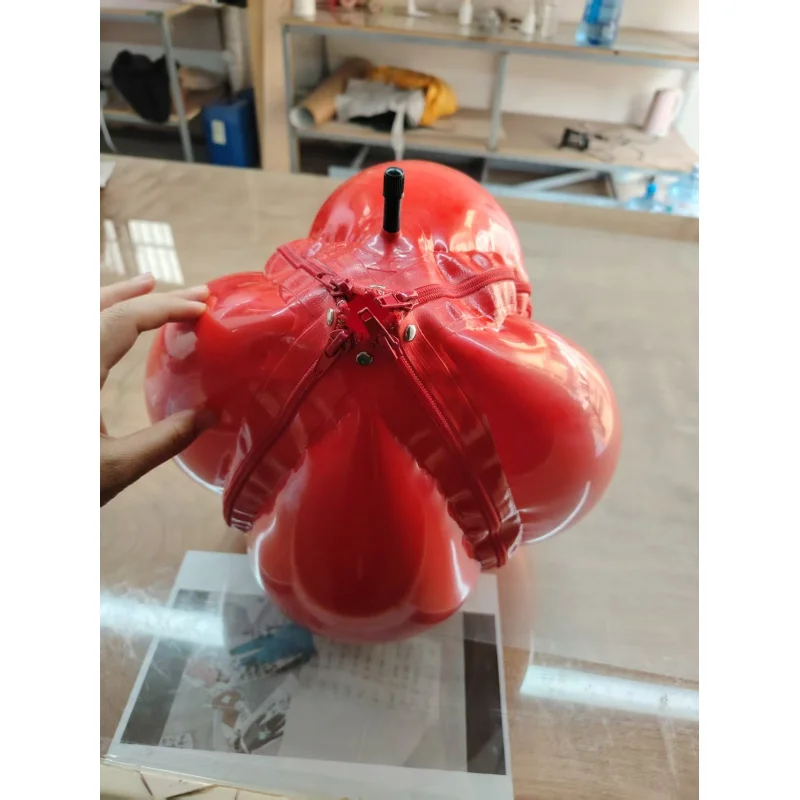 Custom latex suits and inflatable latex hoods