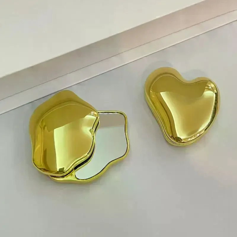 Simpatico specchio per trucco portatile a forma di cuore a doppia faccia rotante per studenti, strumento di bellezza cosmetica, piccolo specchio portatile per ragazze