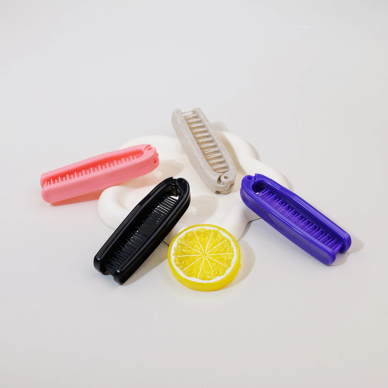 가는 이빨 디자인의 접이식 휴대용 플라스틱 빗과 휴대용 정전기 방지 포켓 빗, 실제 머리 가발 전용