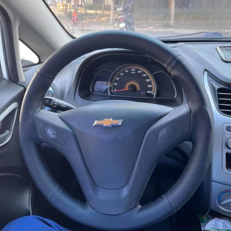 

Для Chevrolet Sail 2010-2013 ручной работы черный нескользящий чехол на руль из натуральной кожи автомобиля