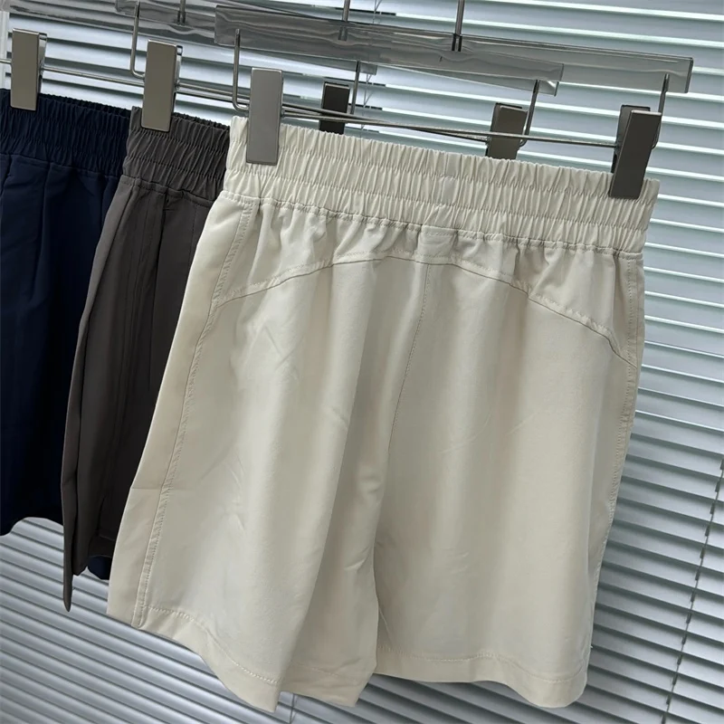 Damskie sportowe spodenki z wysokim stanem, luźny krój, oddychające, do biegania, proste nogawki, cienkie, z detalem z poliestru...