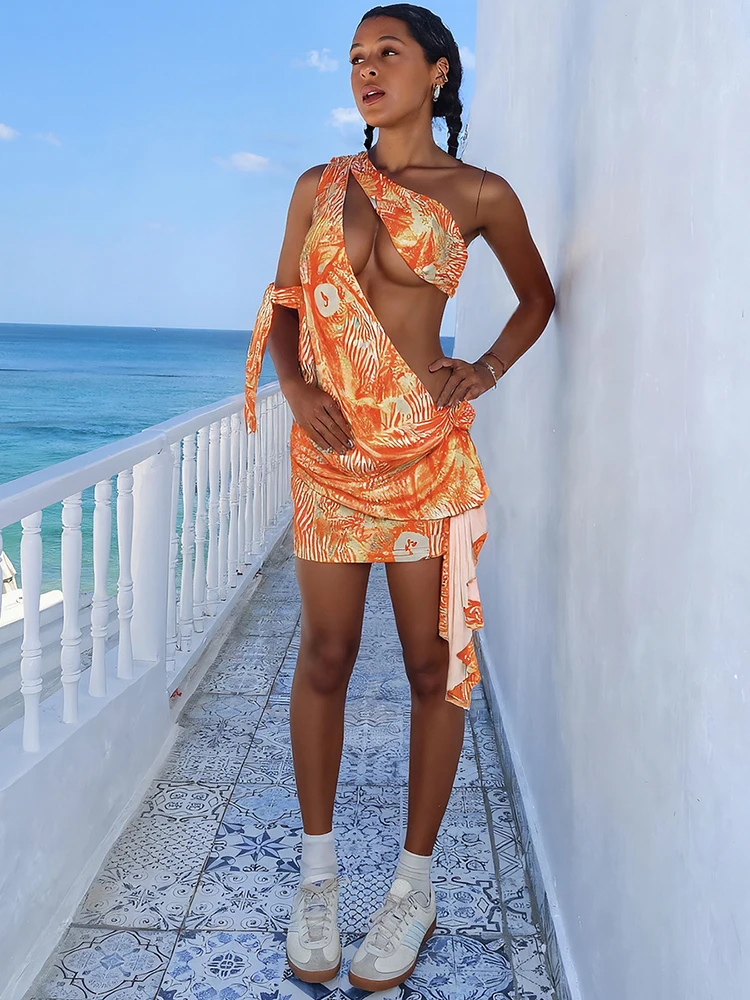 Macheda Irregular Hollow 패션 원피스 여성 여름 트렌드 Applique 편향 Collar Ruffles Tassel Midnight Club Party Mini Bodycon