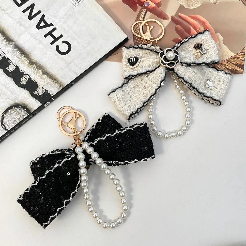 2025 المرأة القماش Bowknot سلاسل المفاتيح حزام Keyrings سيارة مفتاح سلسلة حقيبة العرافة الحلي الإبداعية حلقة رئيسية مجوهرات الأزياء