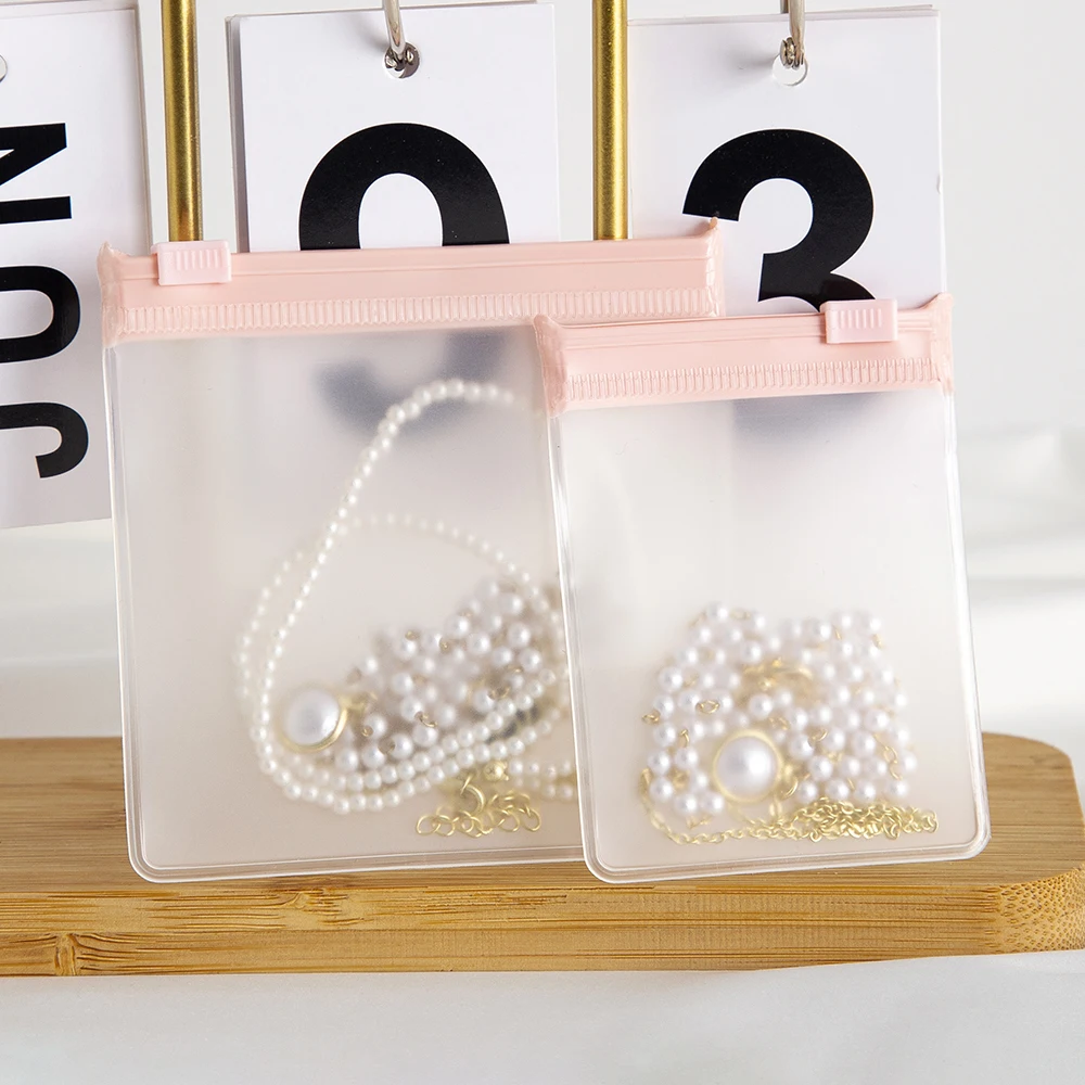 Bolsa con cremallera de joyería rosa personalizada, bolsa de sobre de almacenamiento de plástico EVA esmerilado, anillos, pendientes, colgante, collar, pulsera, embalaje