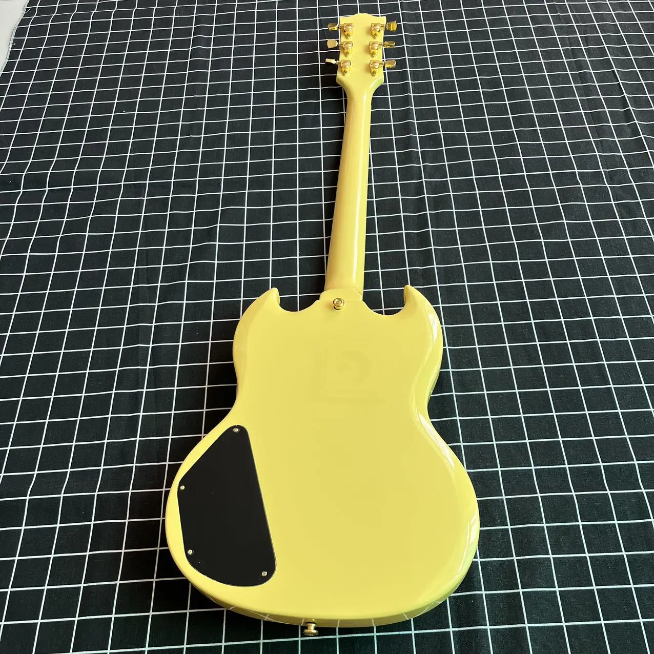 2024 Factory outlet the top quality Cream SG Electric Guitar Gold Hardware White Pick Guard Glossy Finish Good audio quality