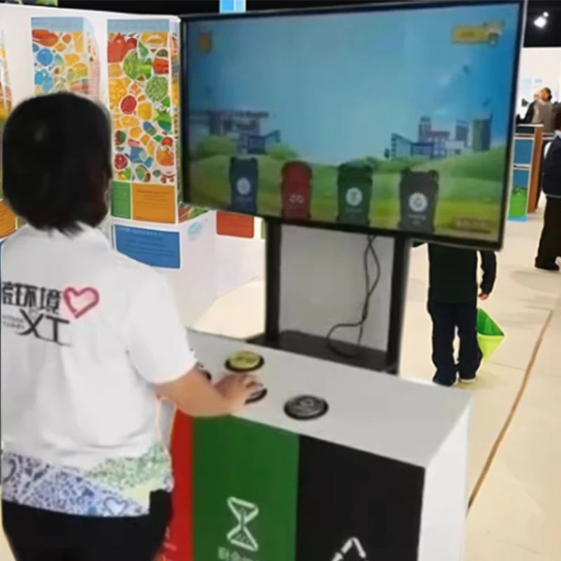 تصنيف القمامة، تعميم العلوم، لعبة تفاعلية، معرض علمي، ألعاب علمية، ألعاب تفاعلية