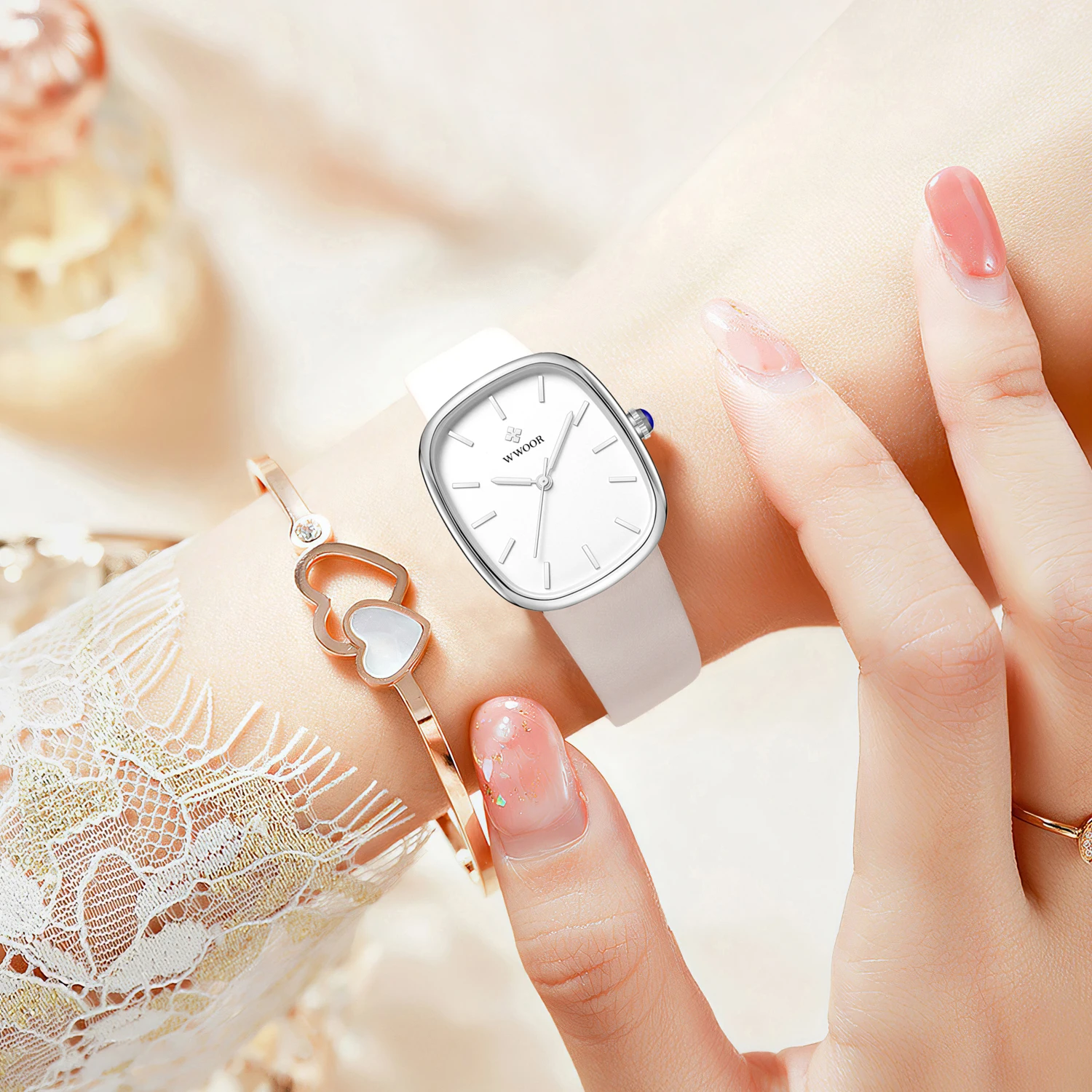 WWOOR 타원형 다이얼 여성용 시계 여성을위한 고급 가죽 스트랩 방수 쿼츠 시계 패션 단순 숙녀 복장 실버 시계