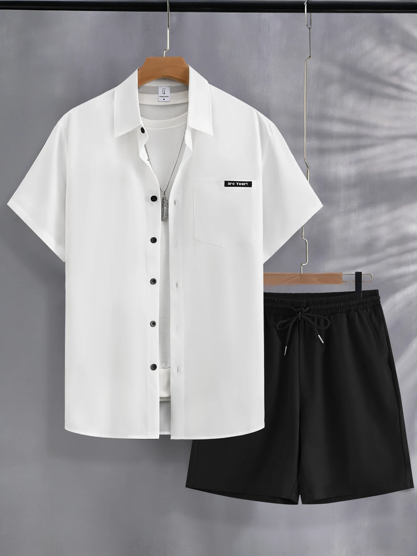 Men's Two-Piece Outfit: White Short-Sleeved Shirt with Patch Pockets Paired with Black Drawstring Shorts, Solid Color Casual Summer Set